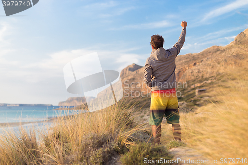 Image of Free active man enjoying beauty of nature.