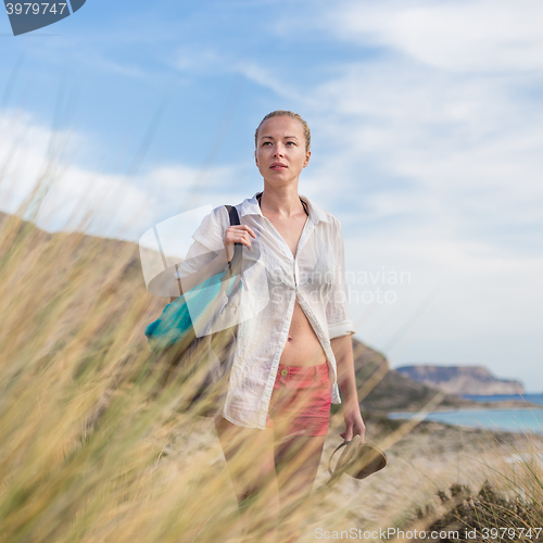 Image of Free Happy Woman Enjoying Sun on Vacations.