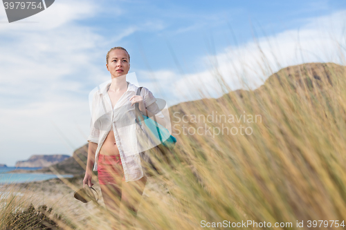 Image of Free Happy Woman Enjoying Sun on Vacations.