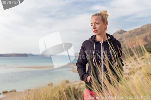 Image of Free Happy Woman Enjoying Sun on Vacations.