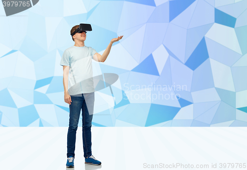 Image of happy man in virtual reality headset or 3d glasses