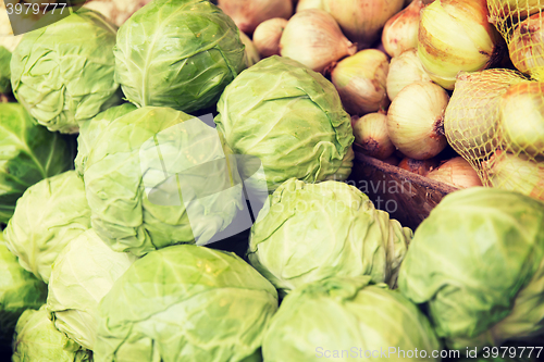 Image of close up of cabbage and onion at street market