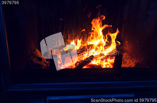 Image of close up of burning fireplace at home