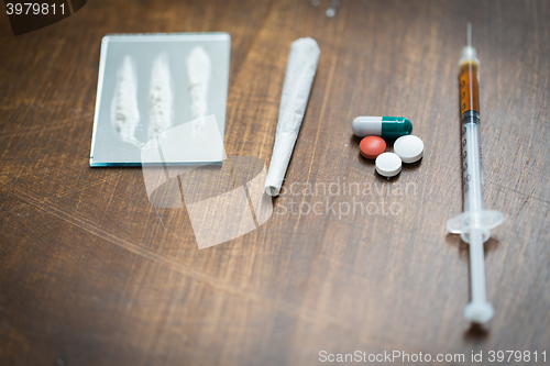 Image of close up of different drugs on table