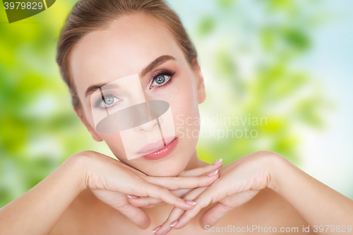 Image of beautiful young woman face and hands