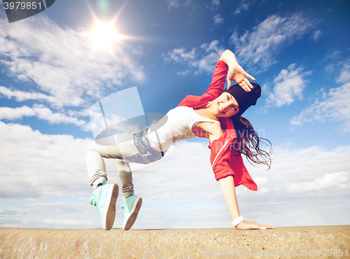 Image of beautiful dancing girl in movement