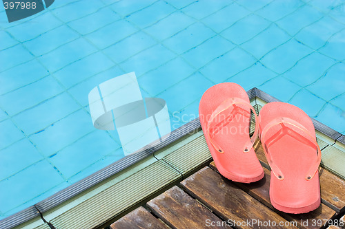 Image of Flip Flops by the Pool