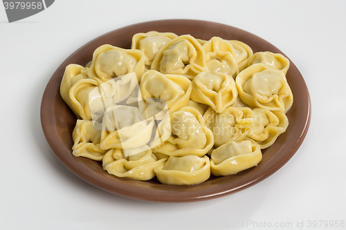 Image of Boiled prepared homemade russian dumplings or pelmeni with beef meat