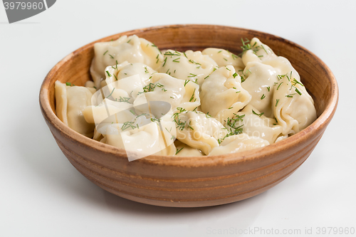 Image of Boiled prepared homemade russian dumplings or pelmeni with beef meat