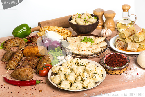 Image of lot of different dishes on the holiday table