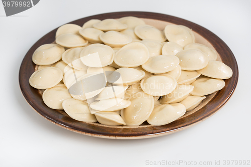 Image of Boiled prepared homemade russian dumplings or pelmeni with beef meat