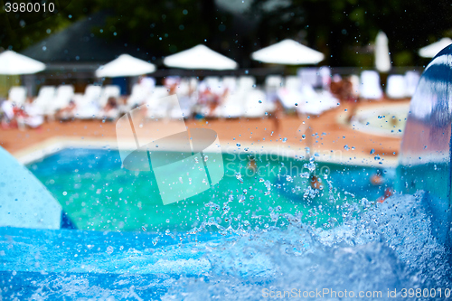 Image of swimming pool and umbrellas