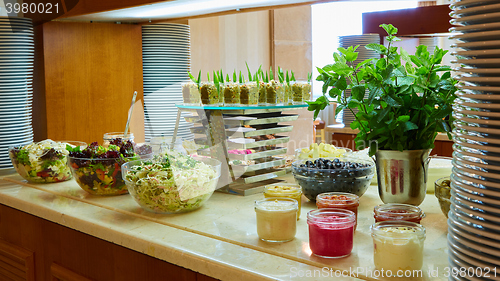 Image of Selection of salads at a buffet bar