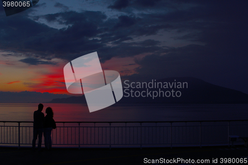 Image of Tourists in sunset