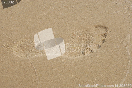 Image of Footprint in the sand on a beach