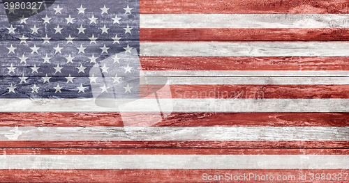 Image of american flag painted on wooden texture