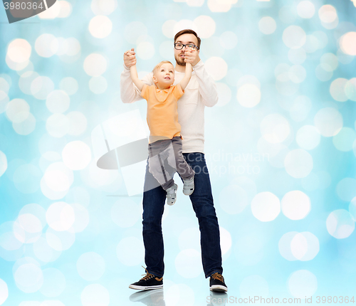 Image of father with son playing and having fun