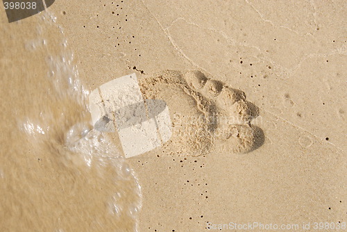 Image of Footprint in the sand on a beach