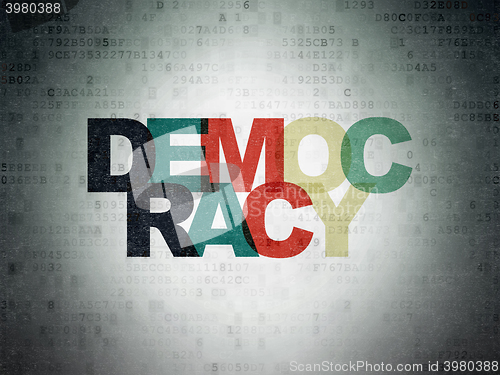 Image of Political concept: Democracy on Digital Data Paper background