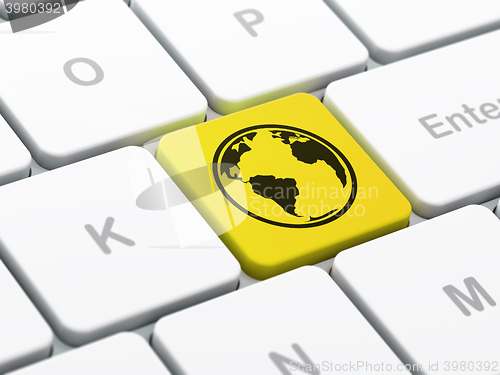 Image of Science concept: Globe on computer keyboard background