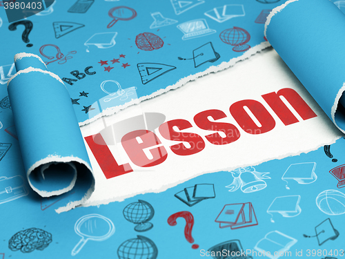 Image of Learning concept: red text Lesson under the piece of  torn paper