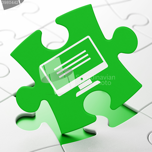 Image of Software concept: Monitor on puzzle background