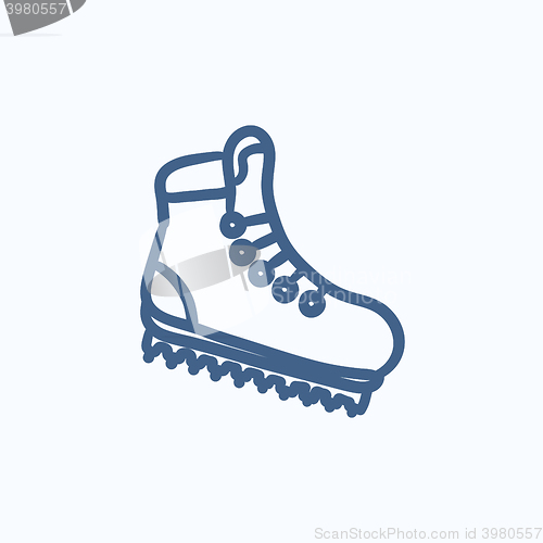 Image of Hiking boot with crampons sketch icon.