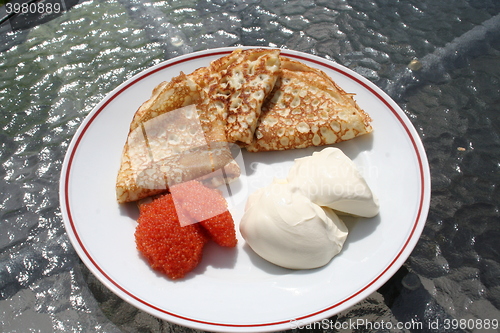 Image of Crepes with caviar and creme fraiche