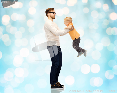 Image of father with son playing and having fun