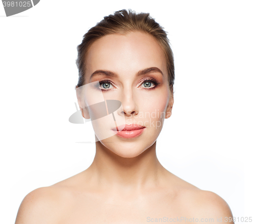 Image of beautiful young woman face over white background