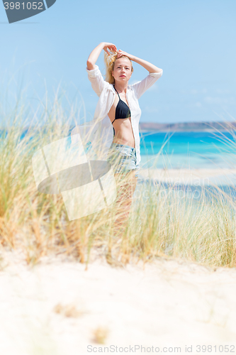 Image of Free Happy Woman Enjoying Sun on Vacations.