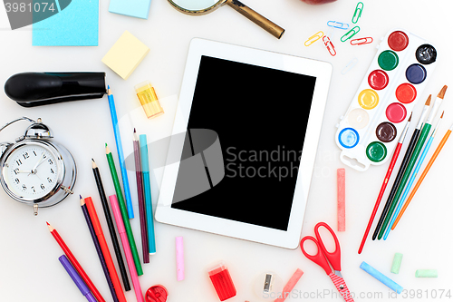 Image of School set with notebooks, pencils, brush, scissors and apple on white background