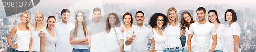 Image of group of happy different people in white t-shirts