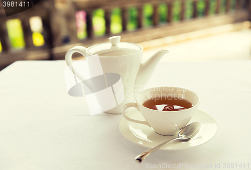 Image of tea-set on table at restaurant or teahouse