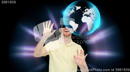 Image of happy man in virtual reality headset or 3d glasses