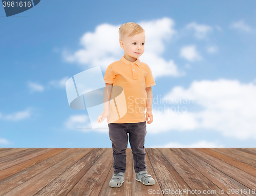Image of happy little boy in casual clothes