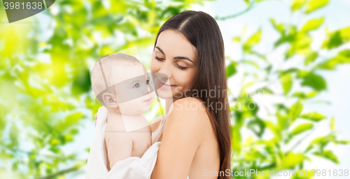 Image of happy mother holding adorable baby