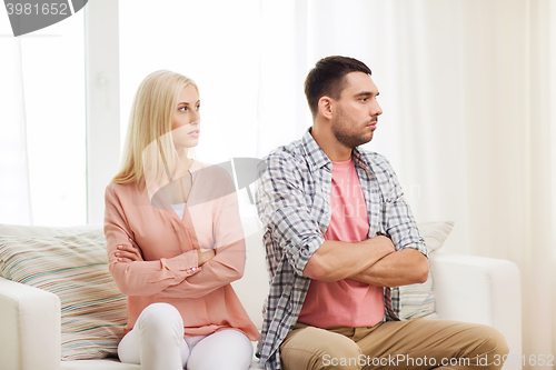 Image of unhappy couple having argument at home