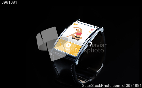 Image of close up of smart watch with fitness app on screen