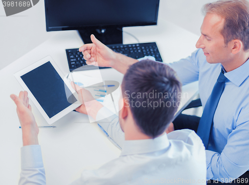 Image of businessmen with notebook and tablet pc