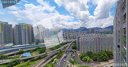 Image of hong kong public estate buildings with landmark lion rock