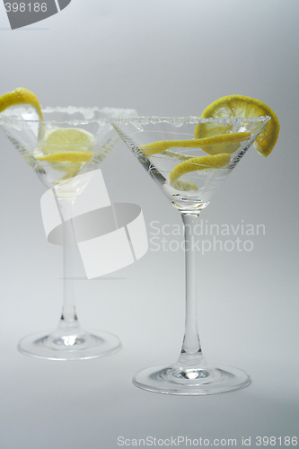 Image of Martini with sugar crust, lemon and peels