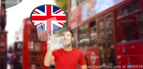 Image of man with text bubble of british flag in london