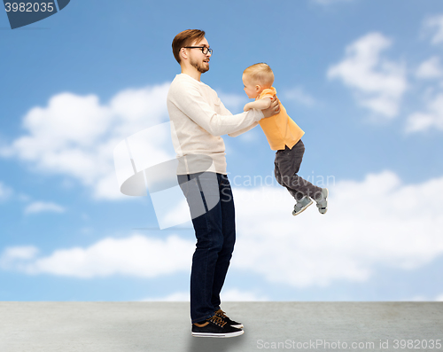 Image of father with son playing and having fun