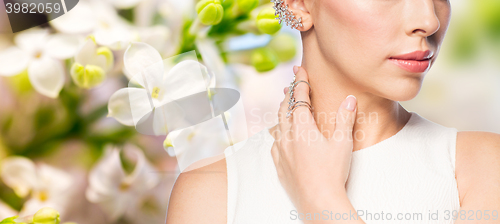 Image of close up of beautiful woman with ring and earring