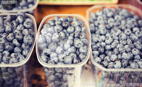 Image of close up of blueberries in boxes at street market