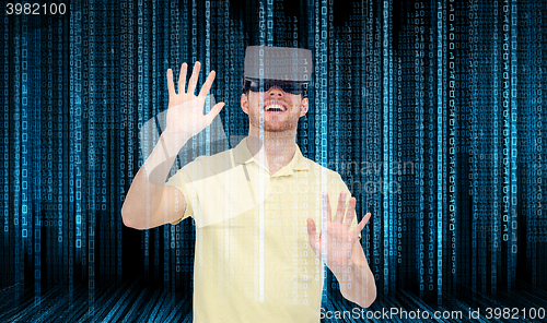 Image of happy man in virtual reality headset or 3d glasses