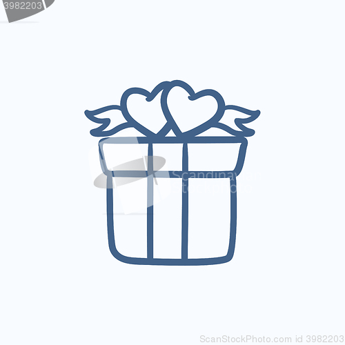 Image of Gift box with hearts sketch icon.