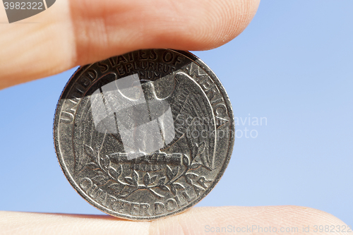 Image of coin in hand  