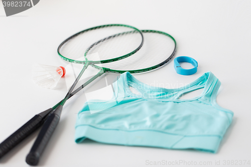 Image of close up of badminton rackets with shuttlecock